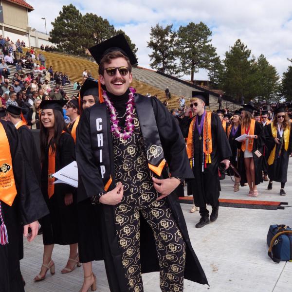 Commencement procession from Norlin Quad to Folsom Stadium