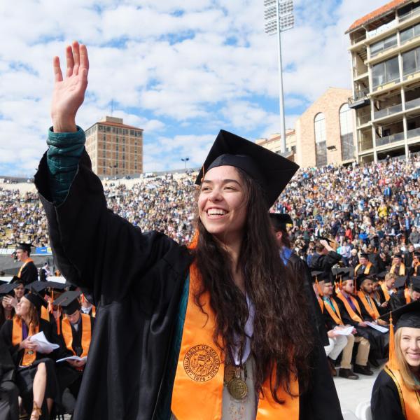 Commencement procession from Norlin Quad to Folsom Stadium