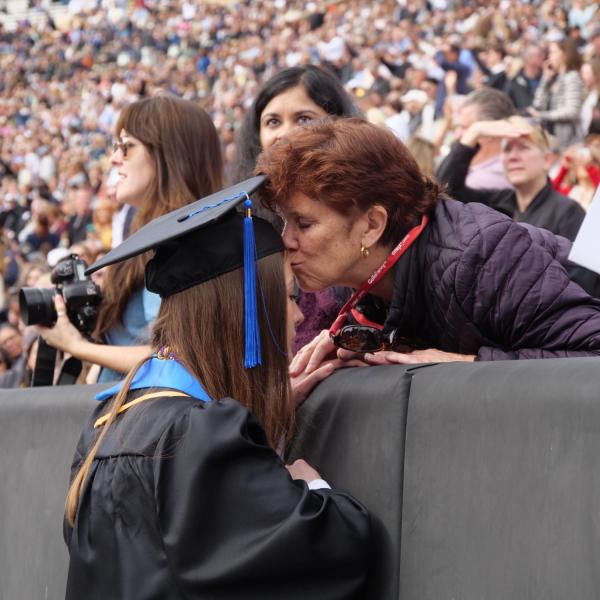 Commencement procession from Norlin Quad to Folsom Stadium