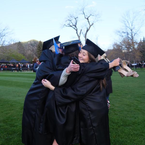Students and faculty gather on the quad before processing to Folsom Stadium