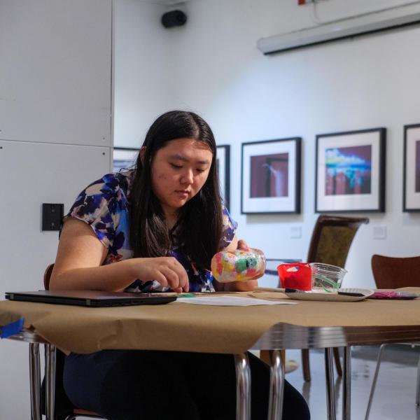 Campus community members participate in an activity in the CU Museum of Natural History's BioLounge