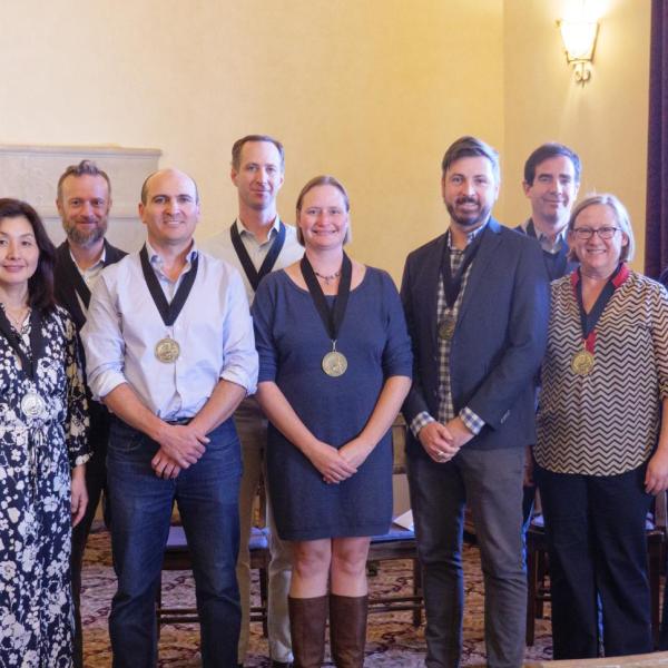 Group photo of faculty receiving tenure (or hired with tenure)