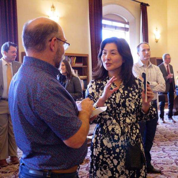 Tomoko Matsuo speaking to Ken Anderson