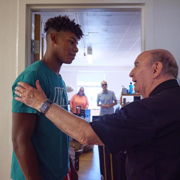 Chancellor Philip DiStefano greets new students and families during move-in