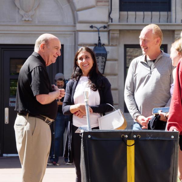 Chancellor Philip DiStefano greets new students and families during move-in