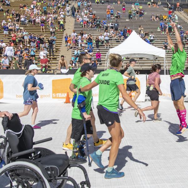 Participants finish up the race and celebrate at Folsom Field.