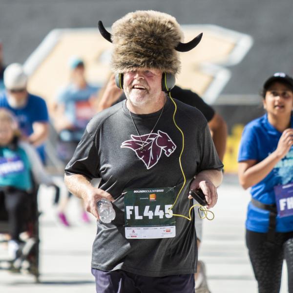 Participants finish up the race and celebrate at Folsom Field.