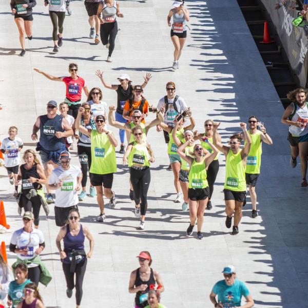 Participants finish up the race and celebrate at Folsom Field.