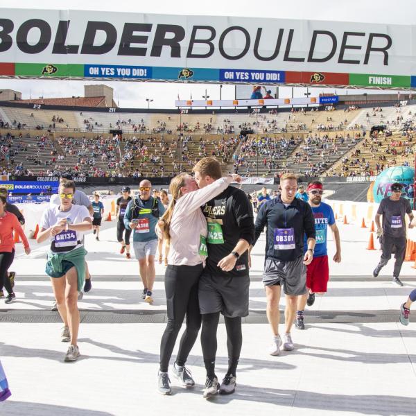 Participants finish up the race and celebrate at Folsom Field.