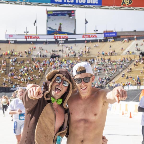 Participants finish up the race and celebrate at Folsom Field.