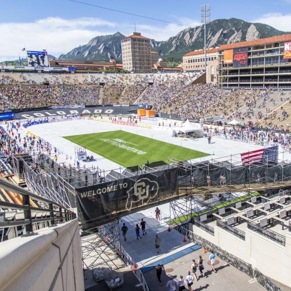 Participants finish up the race and celebrate at Folsom Field.