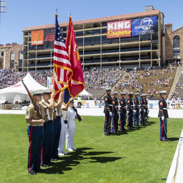 Participants finish up the race and celebrate at Folsom Field.