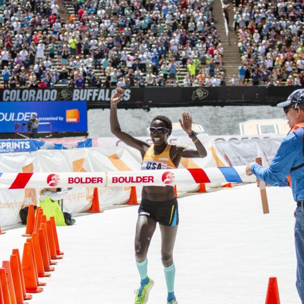 Participants finish up the race and celebrate at Folsom Field.