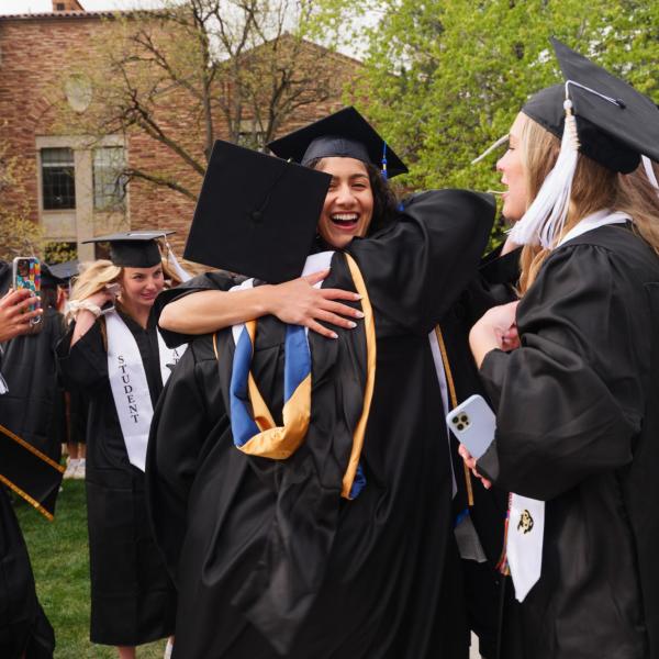 Graduates gather on Norlin Quad before commencement
