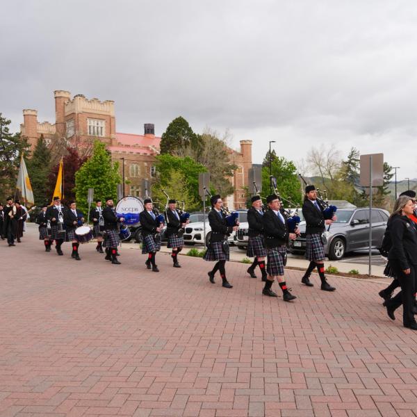 Graduates process to Folsom Field
