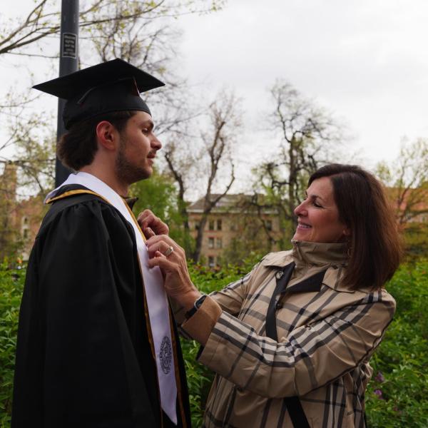 Graduates gather on Norlin Quad before commencement