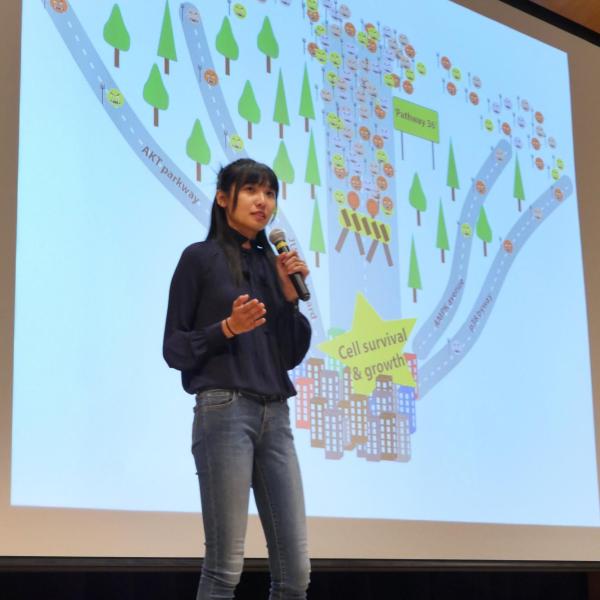Chen Yang gives her speech at the Three Minute Thesis Competition. Photo by Casey A. Cass.