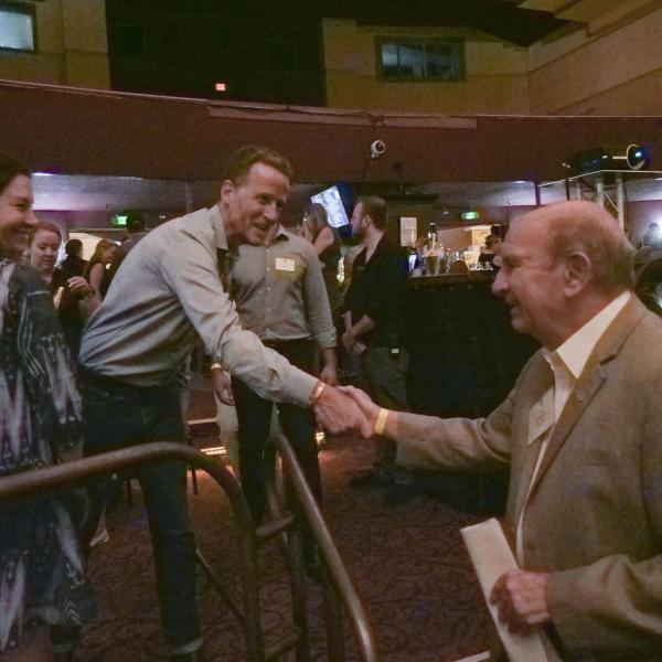 Chancellor Phil DiStefano greets attendees