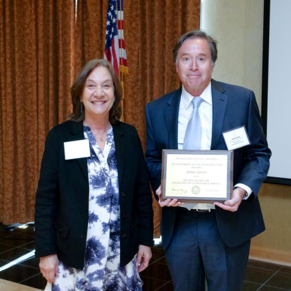 Leadership and Service Award Selection Committee Chair Andrea Feldman and recipient James Green
