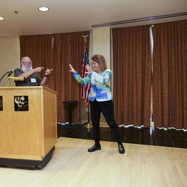 Teaching & Pedagogy Award Selection Committee Chair Adam Norris and recipient Priscilla Craven.