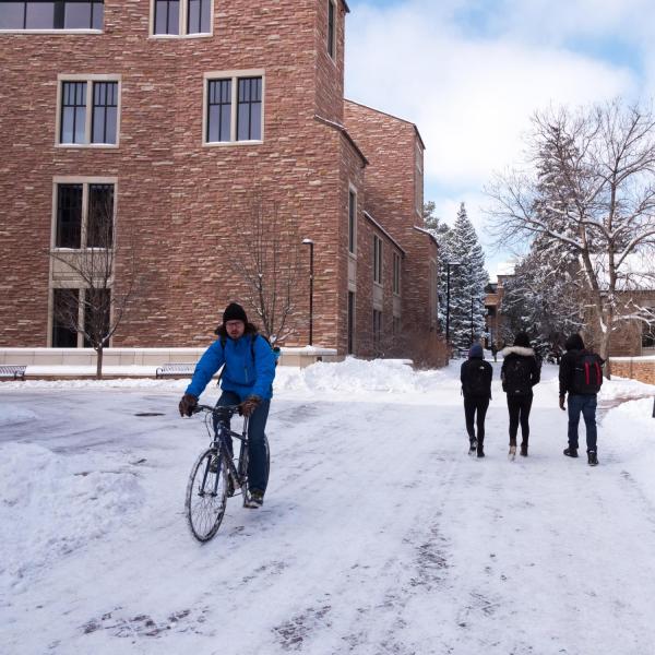 Campus community members trek across a snowy campus on Tuesday, Feb. 20. Photo by Patrick Campbell.
