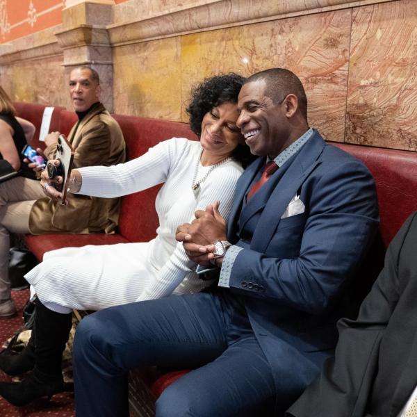 CU Regent Wanda James takes a selfie with Deion Sanders