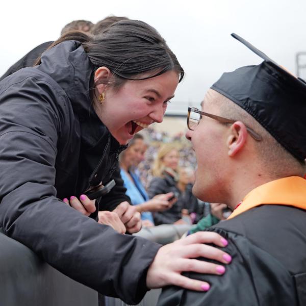Graduates greet friends and family at Folsom Field
