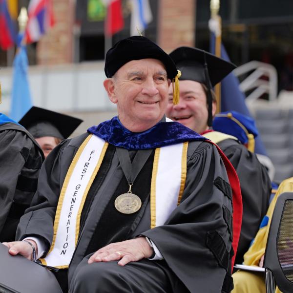 Commencement speaker Apple co-founder Steve Wozniak seated next to Chancellor Phil DiStefano