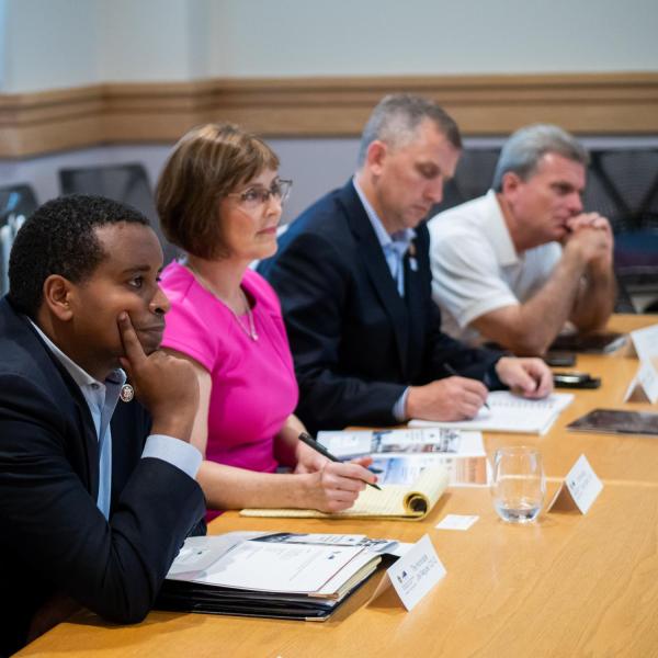 Members of Congress (left to right) Joe Neguse, Kathy Castor, Sean Casten and Earl L. "Buddy" Carter listen during a discussion about the work being done at CIRES. (Photo by Patrick Campbell/University of Colorado)