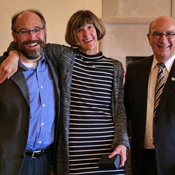 Professor Janet DeGrazia, center, is flanked by Chancellor Philip DiStefano and Associate Dean of Engineering Ken Anderson during the 12th Annual Convocation Awards and Presentations Celebrating Faculty Achievements. (Photo by Casey A. Cass/University of Colorado)