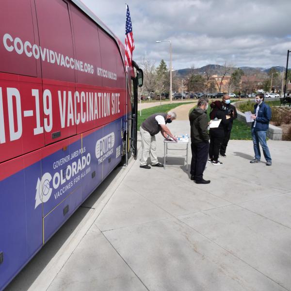 A mobile COVID-19 vaccination bus is parked at the Williams Village residence complex at CU Boulder. (Photo by Casey A. Cass/University of Colorado)