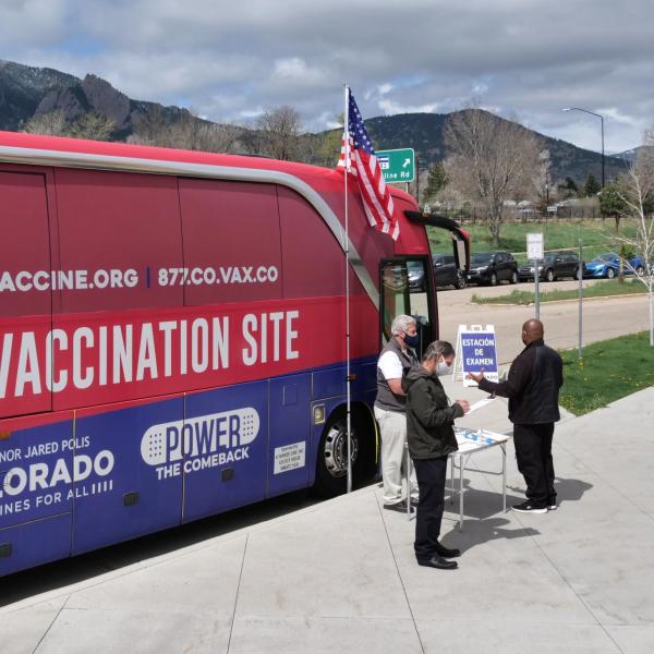 A mobile COVID-19 vaccination bus is parked at the Williams Village residence complex at CU Boulder. (Photo by Casey A. Cass/University of Colorado)