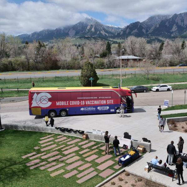 A mobile COVID-19 vaccination bus is parked at the Williams Village residence complex at CU Boulder. (Photo by Casey A. Cass/University of Colorado)