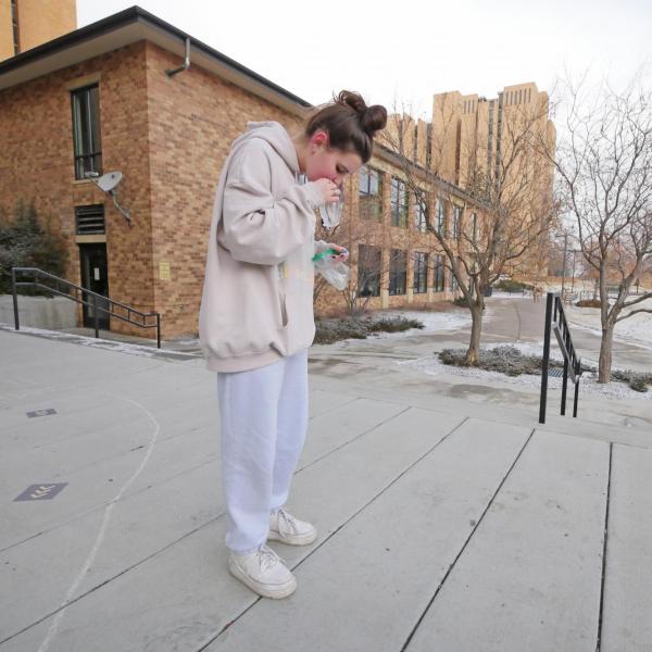 Mia Gallay, a psychology major from Chicago, takes a COVID-19 test at Williams Village at CU Boulder. (Photo by Casey A. Cass/University of Colorado)