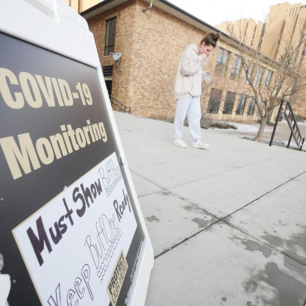 Mia Gallay, a psychology major from Chicago, takes a COVID-19 test at Williams Village at CU Boulder. (Photo by Casey A. Cass/University of Colorado)