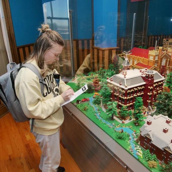 Campus community members explore the Lego exhibit at the Heritage Center