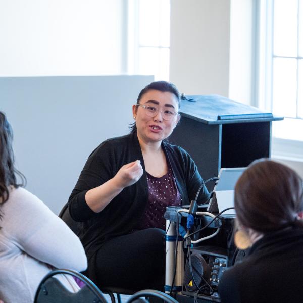 Woman gives presentation at DLAW 2017 session