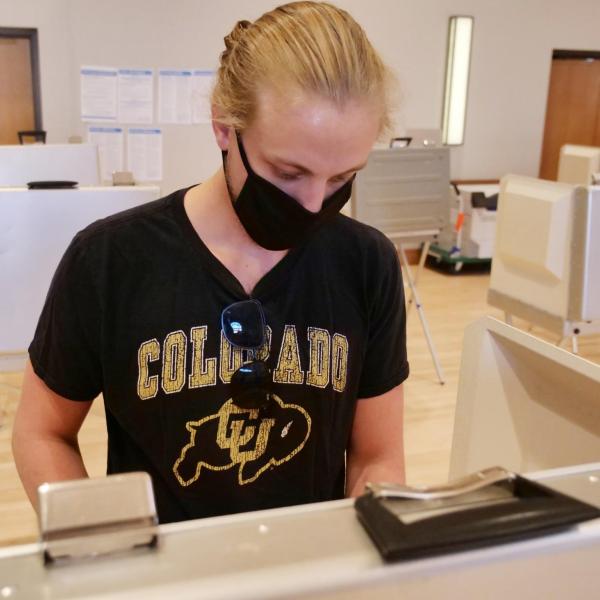 Owen Arnold, a junior media production student from Chicago, votes at a polling place in the University Memorial Center at CU Boulder. (Photo by Casey A. Cass/University of Colorado)