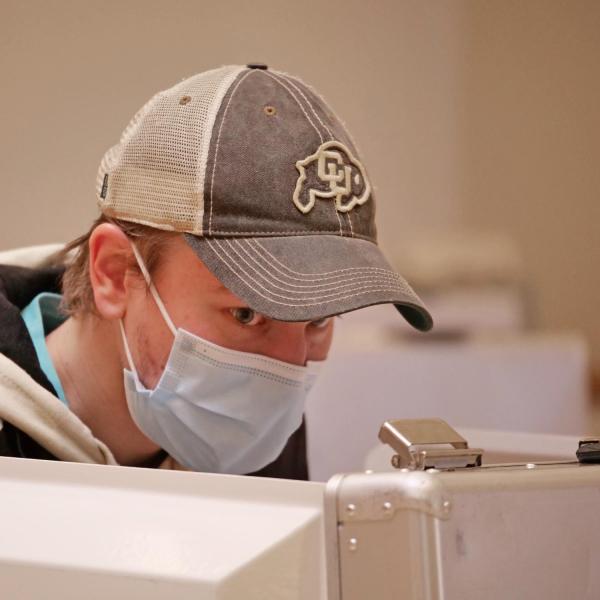 Nick Gary, a junior biochemistry student from Palo Alto, California, votes at a polling place in the University Memorial Center at CU Boulder. (Photo by Casey A. Cass/University of Colorado)