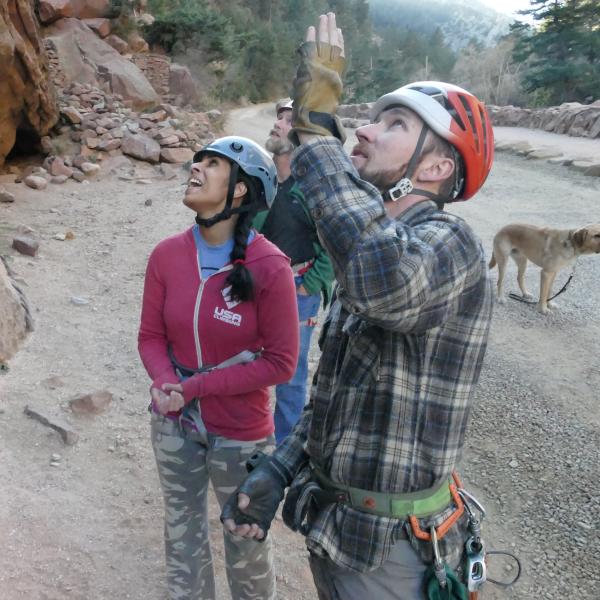 University of Colorado senior psychology major Esha Mehta gets some pointers from Paradox Sports Program Director Adam Fisher while rock climbing in Eldorado Canyon near Boulder. Mehta is a blind competitive rock climber.