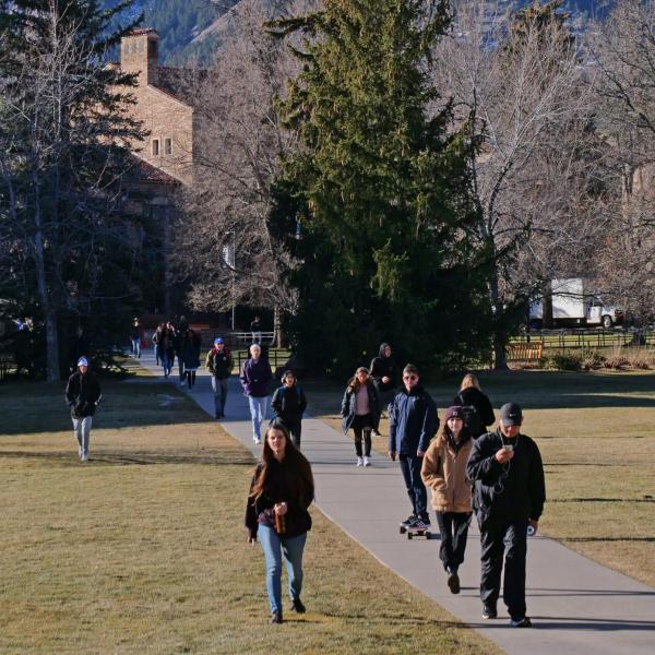 Students make their way across Norlin Quad on the first day of classes for spring 2020 at CU Boulder. (Photo by Casey A. Cass/University of Colorado)