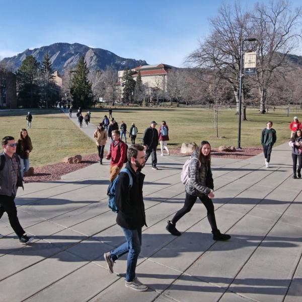 Students make their way across Norlin Quad on the first day of classes for spring 2020 at CU Boulder. (Photo by Casey A. Cass/University of Colorado)
