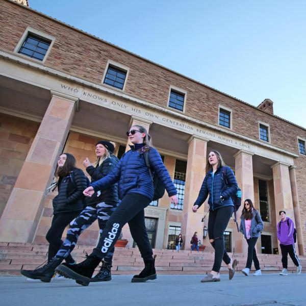 Students make their way past Norlin Library on the first day of classes for spring 2020 at CU Boulder. (Photo by Casey A. Cass/University of Colorado)