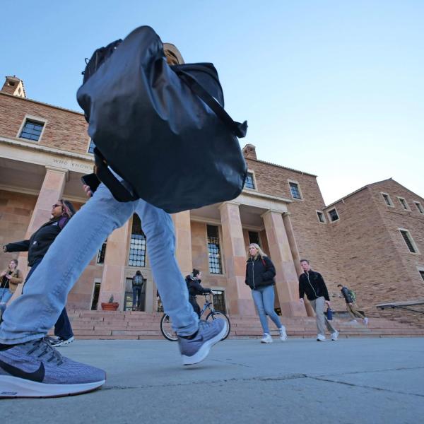 Students make their way past Norlin Library on the first day of classes for spring 2020 at CU Boulder. (Photo by Casey A. Cass/University of Colorado)