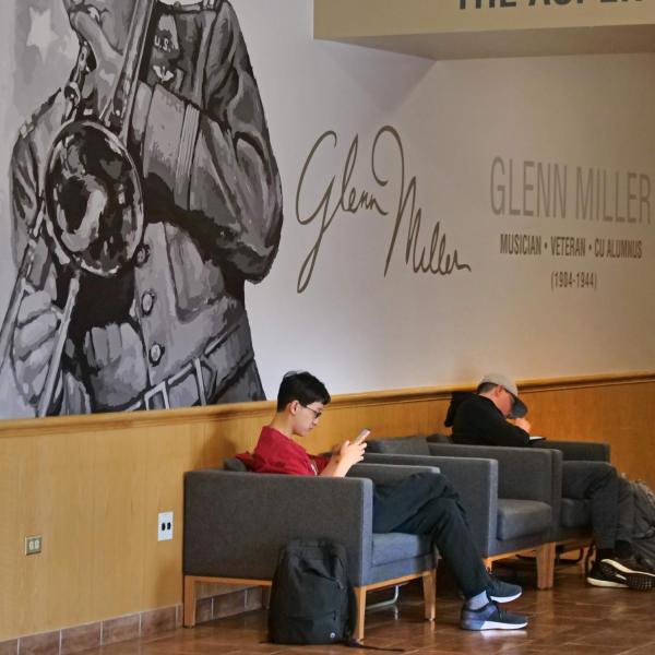 A couple of students relax in the University Memorial Center on the first day of classes for spring 2020 at CU Boulder. (Photo by Casey A. Cass/University of Colorado)