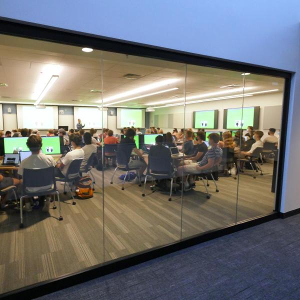 A full class in the Rustandy Building on fall 2021's first day of classes at CU Boulder. (Photo by Casey A. Cass/University of Colorado)