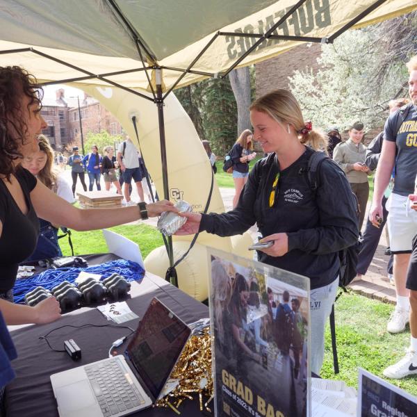 Graduating students get schwag as part of Grad Appreciation Days.