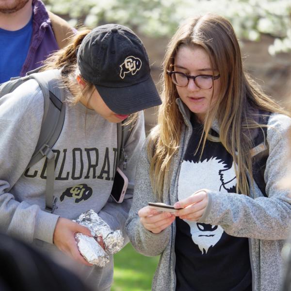 Graduating students enjoy free burritos from Cafe Mexicali as part of Grad Appreciation Days.