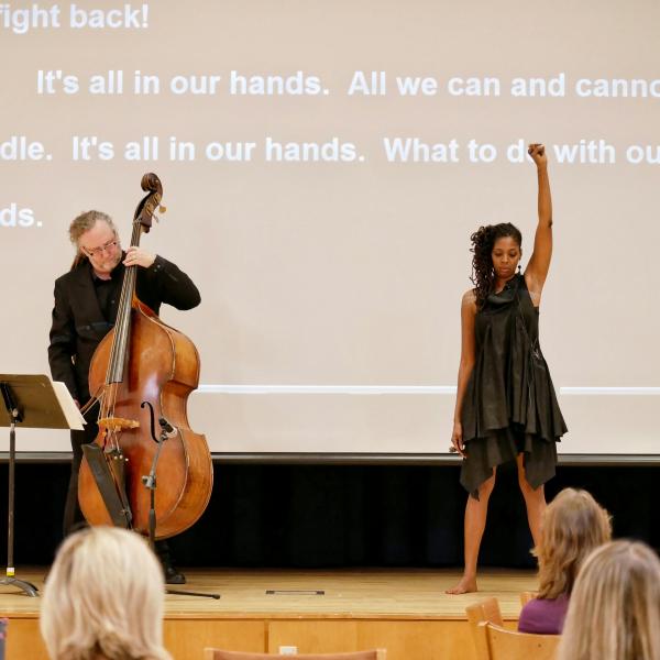 Dr. Brian Casey, College of Music, and Tiya Trent, TRIO program director at CU, perform "Hands Up"