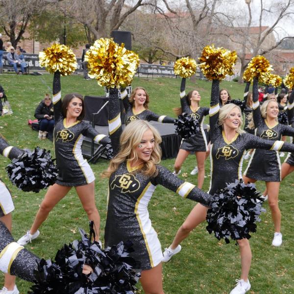 Cheerleaders at the Homecoming football game against the Cal Bears